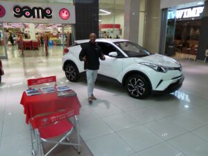 CMH-Toyota-Alberton-display-with-sales-executive-at-the-display-of-the-C-HR